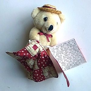 Bear with blanky and note